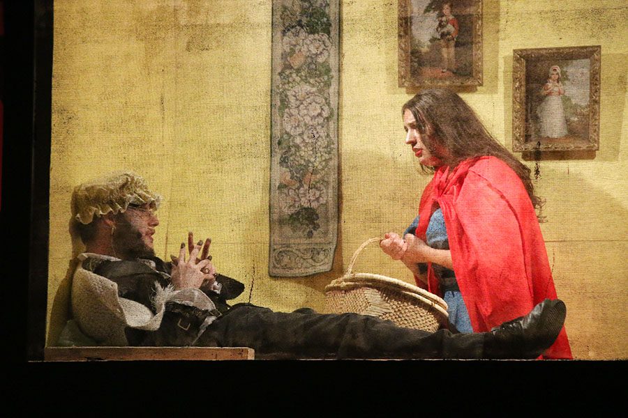 Before being eaten, Little Red Riding Hood, played by junior Natasha Roh, talks with the Wolf, played by junior Jayden Moore.