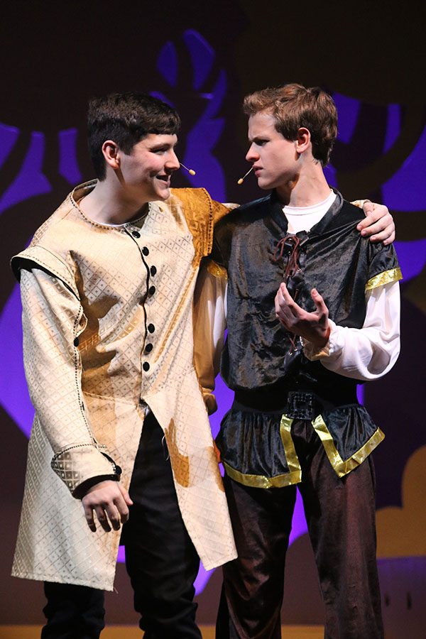 Cinderella's Prince, played by junior Graham Wilhauk, and Rapunzel's Prince, played by sophomore Noah Smith, sing "Agony."