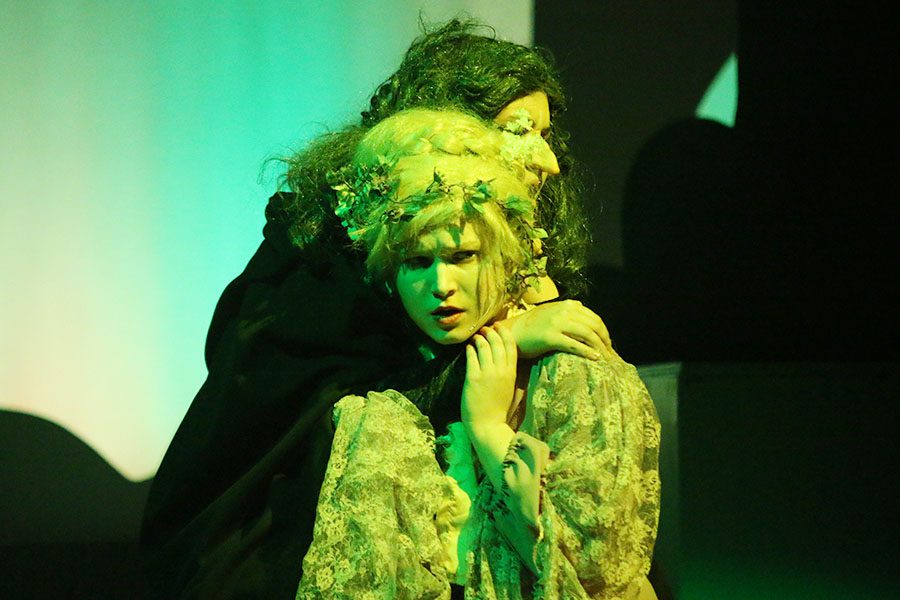 The Witch, played by junior Lauryn Hurley, hugs Rapunzel, played by junior Julia Feuerborn.