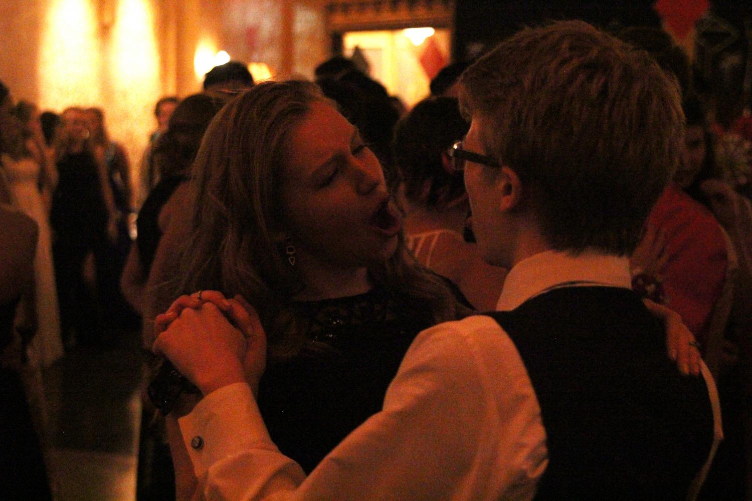 Senior Mary Petropolus sings and dances with her date at prom on Saturday, April 29.