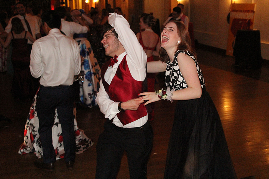 Junior Caroline Gambill dances with her date at prom on Saturday, April 29.