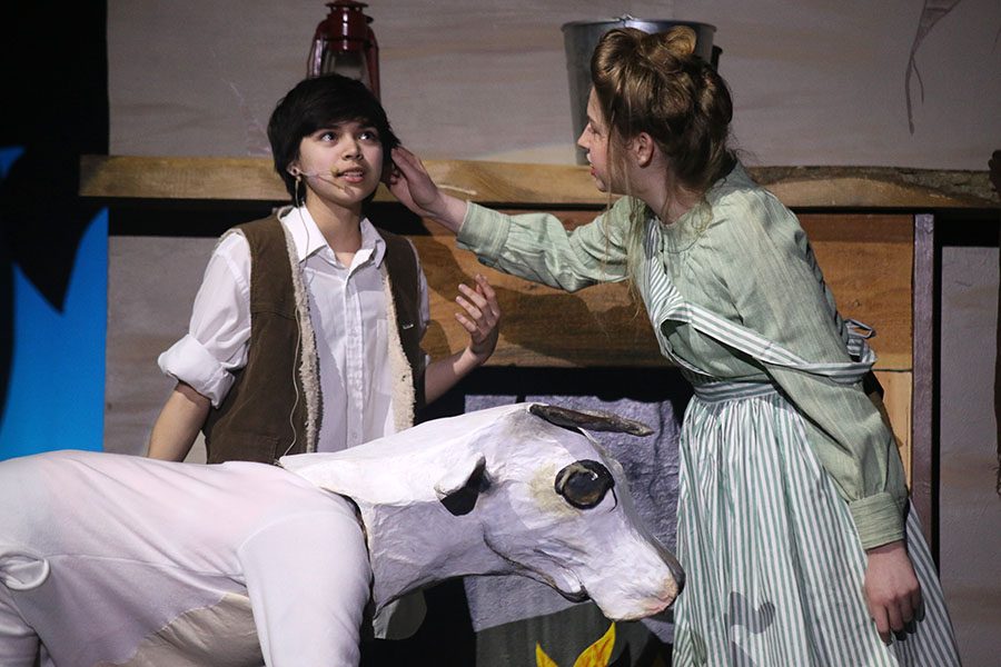 Jack's Mother, played by senior Mary Petropoulos, grabs Jack's ear, played by sophomore Allen Vilchis.