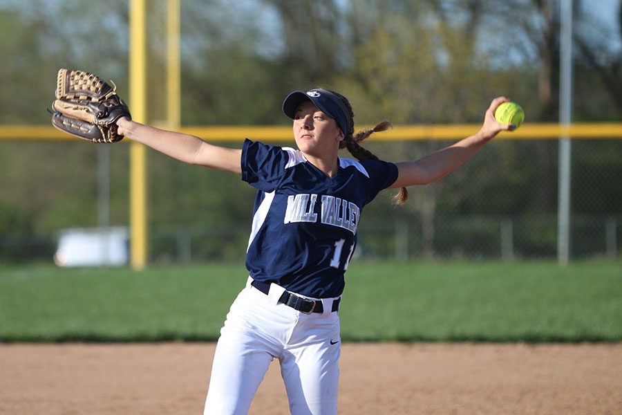 During the third inning, senior Shelby Bonn pitches the ball.