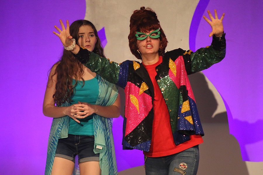 Ms. Griswold, played by sophomore Lauren Rothgeb, teaches Emily, played by junior Holly Burmaster.