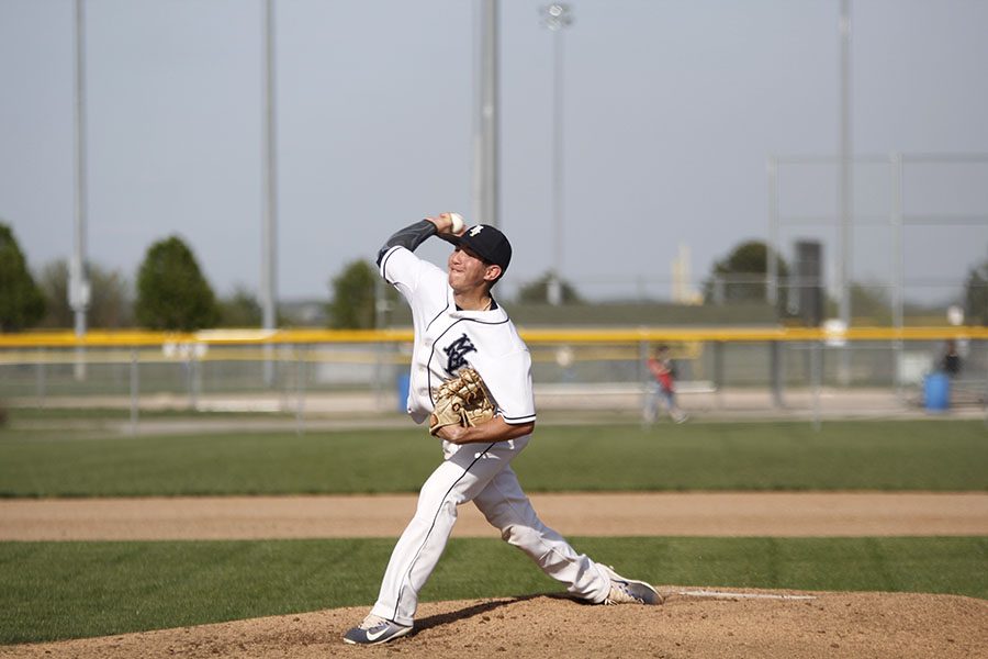 On Tuesday April, 18, senior Jack Blancarte throws out a pitch. The baseball team won against Bishop Meige 9-4.