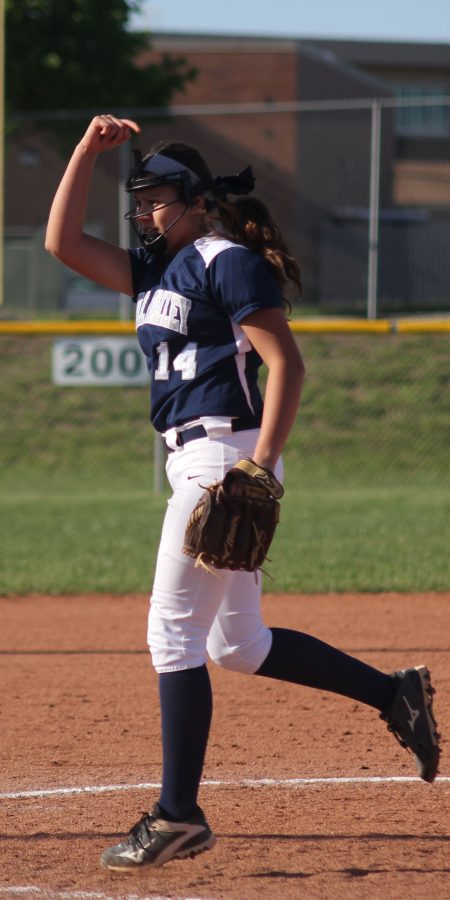 Freshman Lauren Florez pitches the ball. 