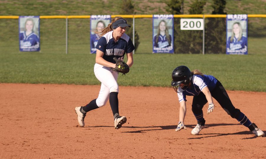 Senior Kristen Kelly runs to get an opponent out. 