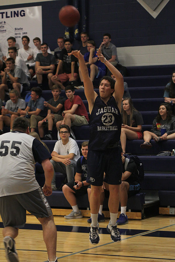 Senior Rowdy Boatwright jumps to shoot the ball. 