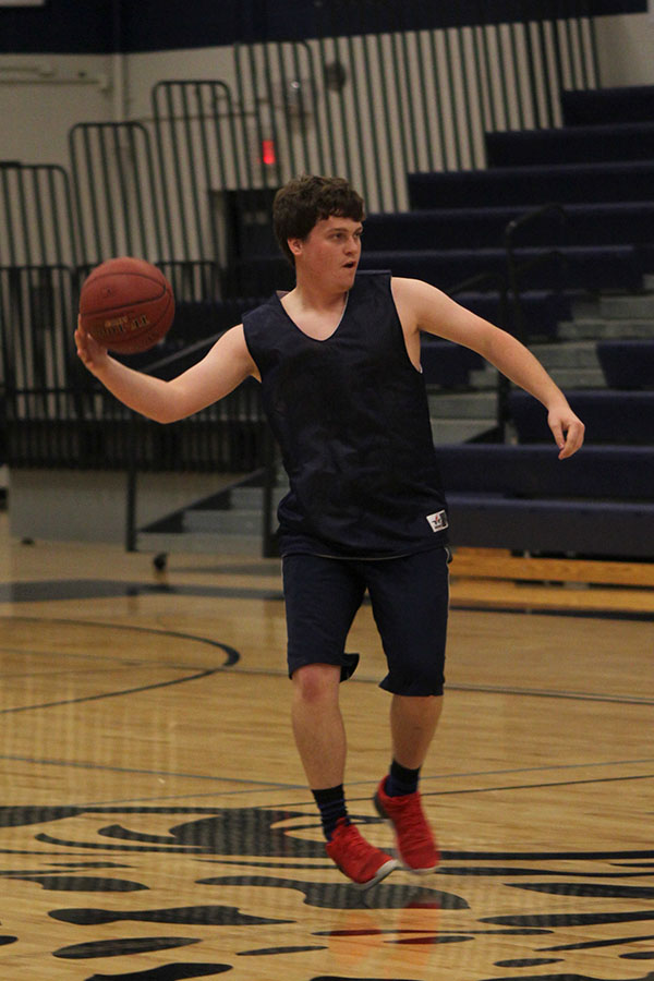 Senior Quintin Bossert prepare to pass the ball. 