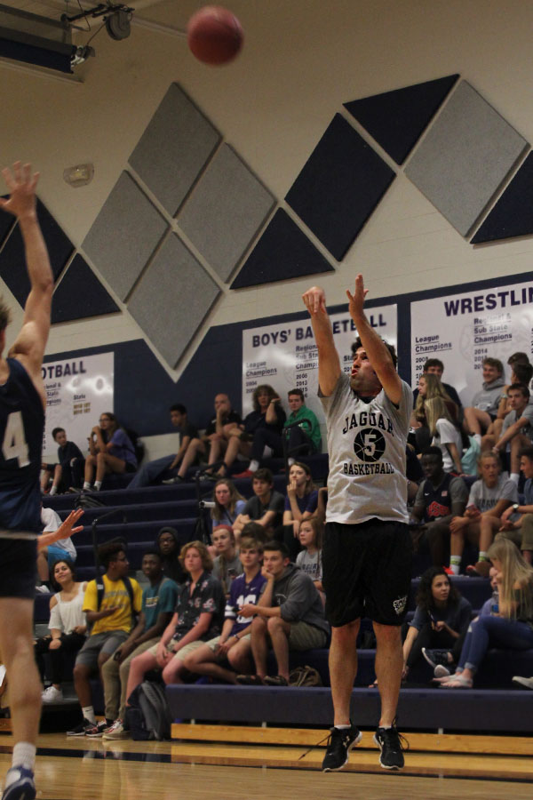 English Mike Strack follows through after shooting the ball.