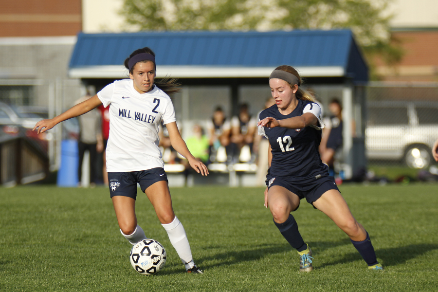 At the start of the game, Senior Haley Freeman gains control of the ball during Senior Night on Tuesday, May 2. The team won against St. James 3-1.