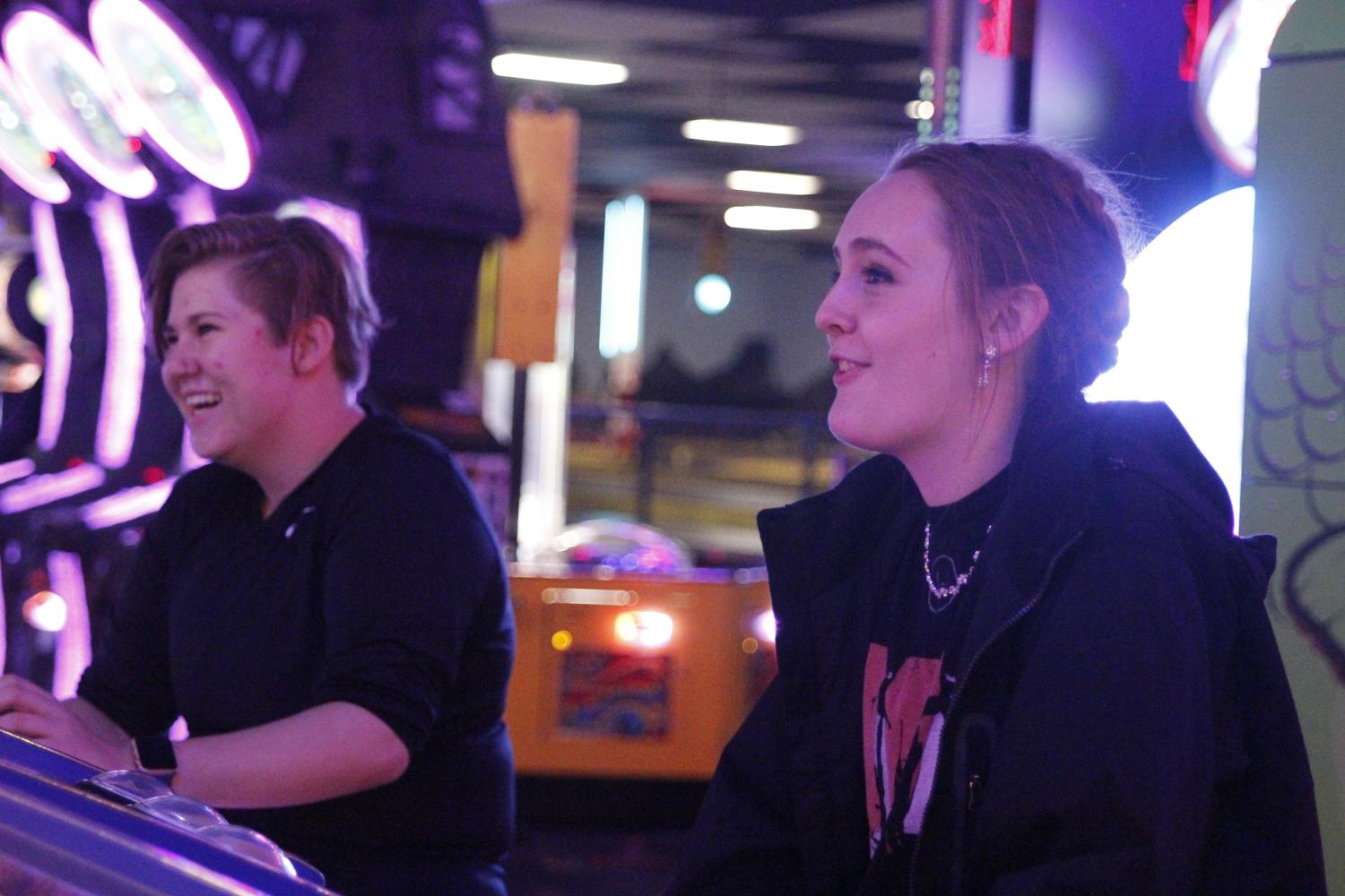 Juniors Ashley Ebner and Ayden Carroll laugh while playing a game at  PowerPlay.