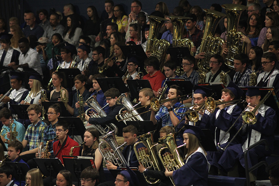 The band plays during graduation. 