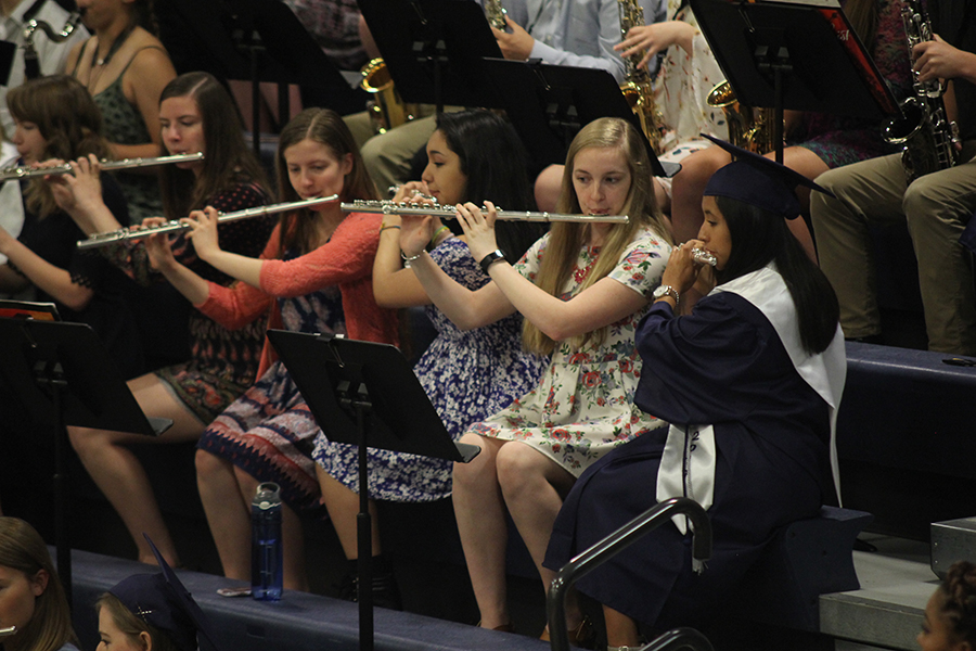 Senior Marina Cruz, along with other flute players, joins the band for the last time in Steel.