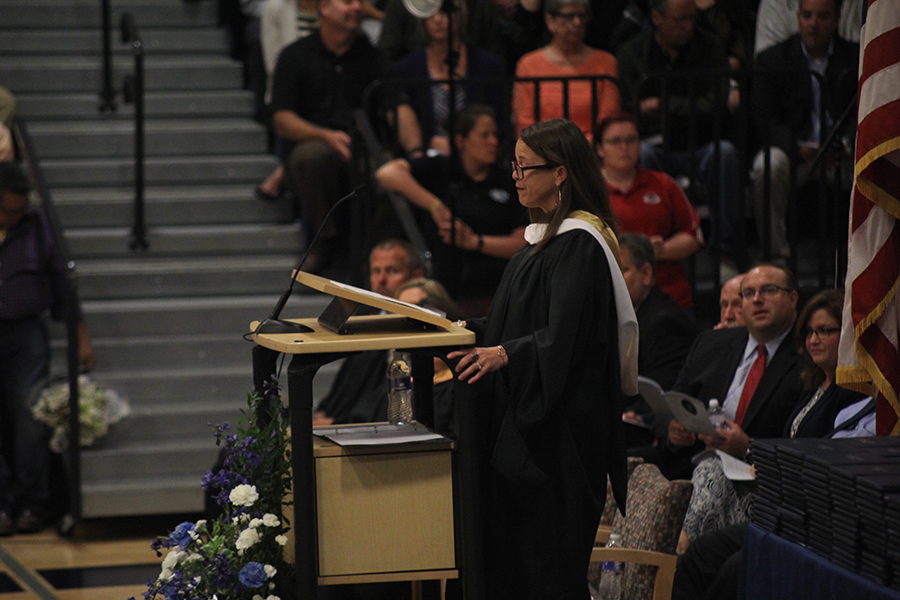 English teacher Kristen Crosbie speaks at graduation. 