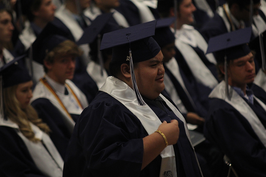 Senior Wesley Keungkhamphong walks up to the stage. 