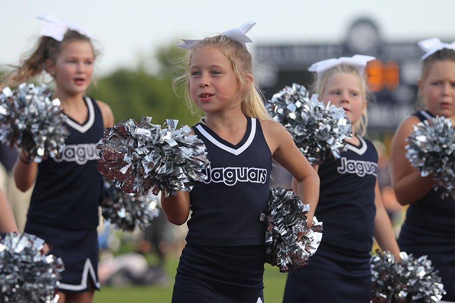 The annual Mill Valley Night Lights event on Friday, Aug. 25 consisted of small-sided scrimmages for players of all ages, raffle ticket drawings and a performance by the Silver Stars. Supporting the players, a Junior Jags cheerleader blows a kiss during one of the cheers.