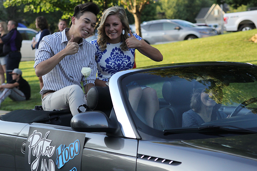 Seniors Simon Vongxay and Peyton Moeder gives the crowd a thumbs up.