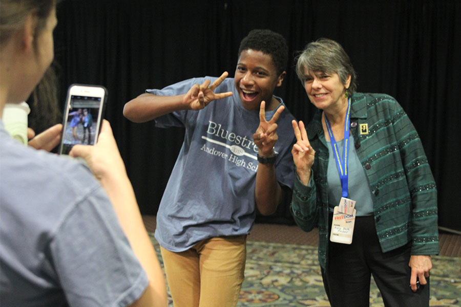 Andover High School student poses for a picture with Mary Beth Tinker of the Tinker vs. Des Moines case.