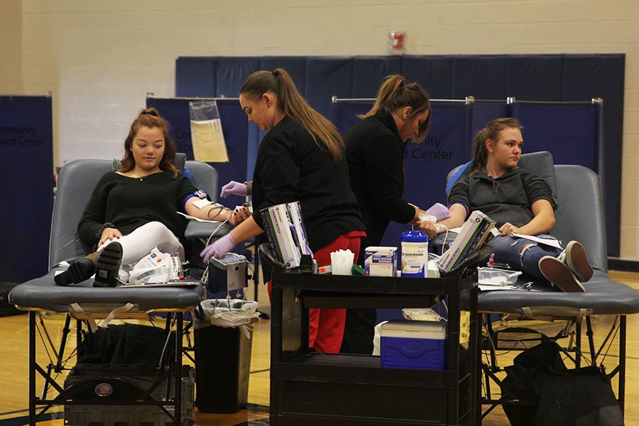 Nurses+from+the+Community+Blood+Center+take+donations+from+junior+Lauren+Harris+and+sophomore+Alison+Wells+on+Thursday%2C+Oct.+19