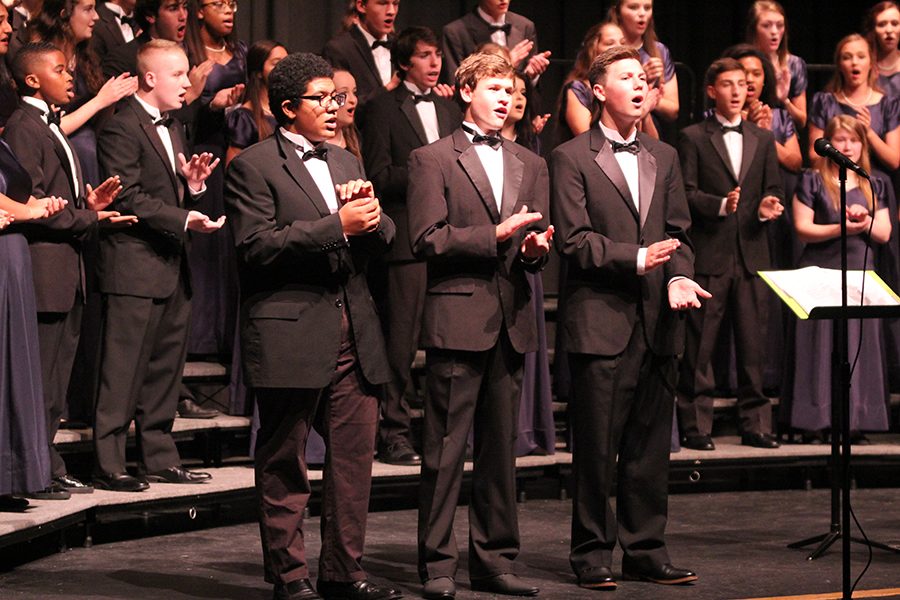Tenor soloists sophomore Jaydon Taylor and juniors Noah Smith and Jack Jaworski perform together during the choir concert on Thursday, Oct. 12.