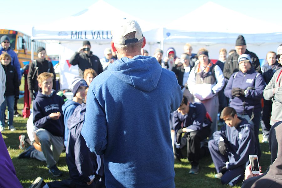 After receiving news that the boys team won second place, head coach Chris McAfee addresses both teams and their parents.