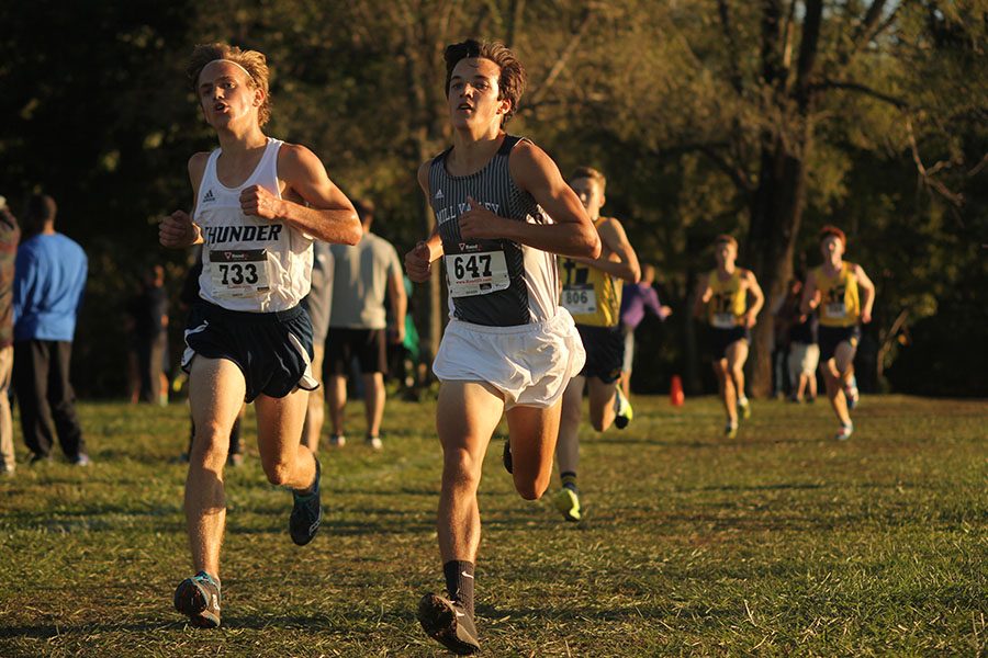 Sophomore Jack Terry strides out for the remaining stretch of the race on Thursday, Oct. 12.