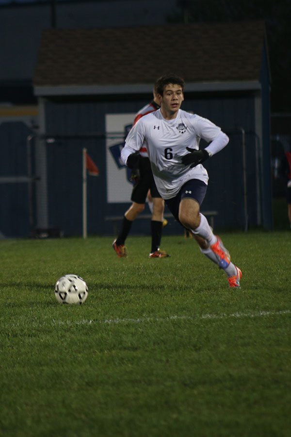 Senior Bradley Teasley runs toward the ball.