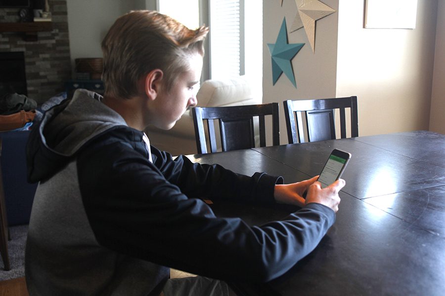 Using the app Nextdoor, sophomore Max Harlow catches up on the latest news going on in his neighborhood. 