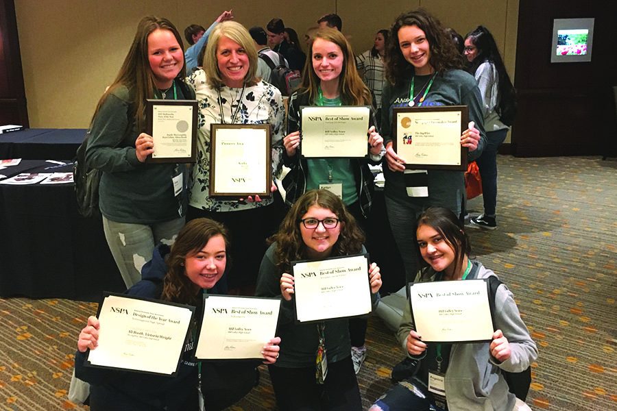 Students who attended the JEA/NSPA National Scholastic Press Association High School Journalism Convention awards ceremony Nov. 17. Six students represented Mill Valley at the convention, attending learning sessions and publications critiques. Their adviser is Kathy Habiger.