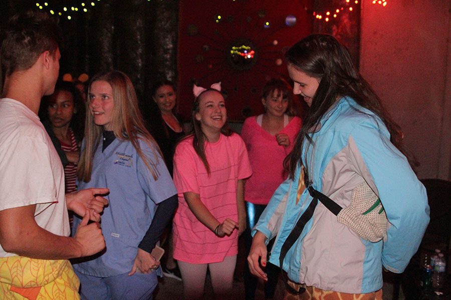 While hosting her Halloween party, junior Ashlyn Windmiller talks with her friends in costumes on Saturday Oct. 28. “It’s always nice to get together and just hang out.”