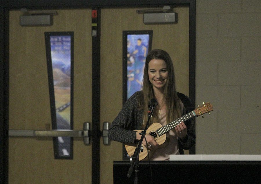 Senior Samantha Mills plays the ukulele to the song Skinny Love.