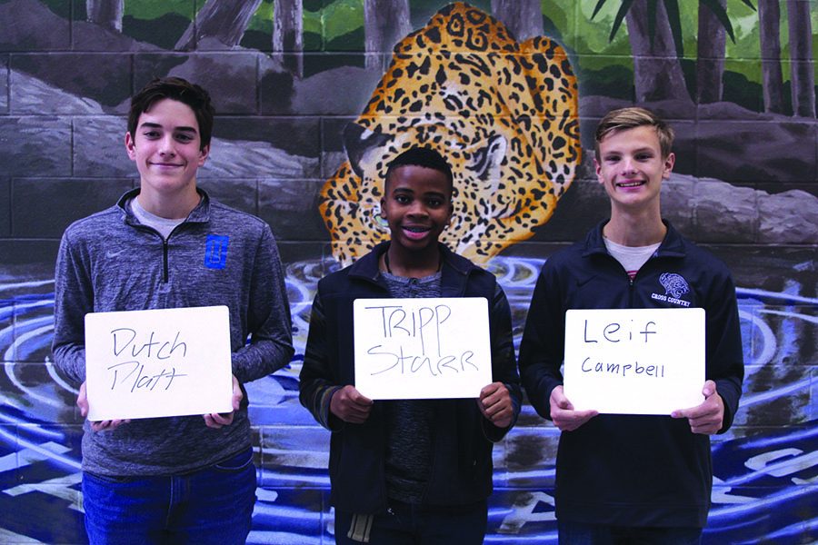 Sophomore Tripp Starr along with freshmen Leif Campbell and Dutch Platt stand together on Monday, Nov. 13 displaying their uncommon names on whiteboards.