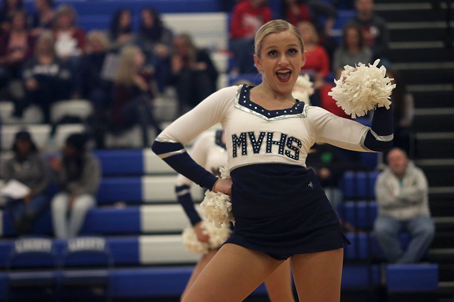 At the Kansas City Classic on Saturday, Dec. 9, junior Bella Line dances in the pom routine.