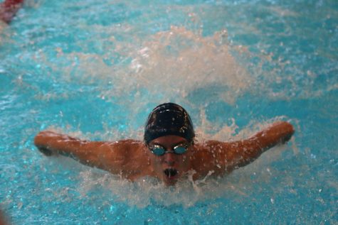 Boys swim places fourth in first meet of the season