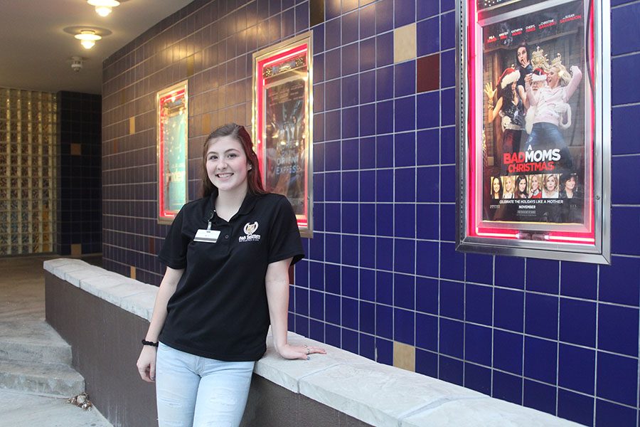 Senior Aly Tennis stands outside the recently modeled B&B movie theater on Tues. Nov. 28. “I didn’t work there before the remodel, but I did go to movies a lot, and it was a little rough because it really needed the remodel. The carpet was kind of gross, the seats were all rickety and it just wasn’t the nicest, Tennis said. I just went there because it was cheap. So after [the renovation], it became clean and new.