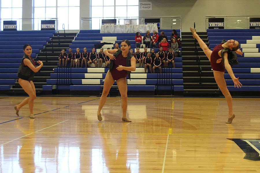 Performing the sophomore ensemble, sophomores Ali Greenhalgh, Samantha Pennington and Sydney Ebner add their own twists to the routine. This routine placed first in the sophomore category.