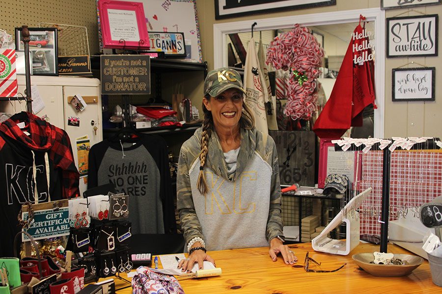 Owner Kristina Gann-Albright stands behind the register of her boutique ShananiGanns located on Johnson Drive.