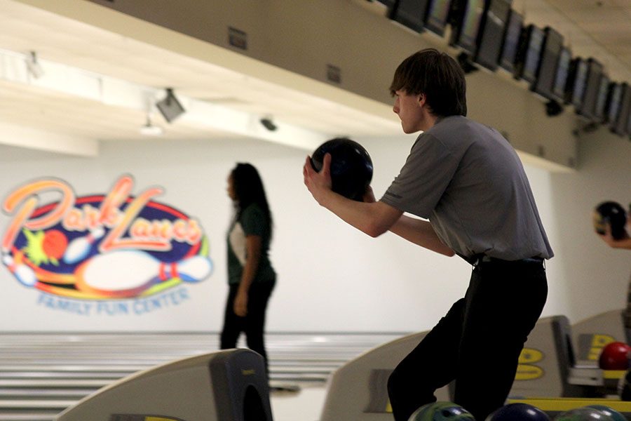 In his beginning stance, junior Ethan Lancaster is up for his turn on Tuesday, Jan. 9.