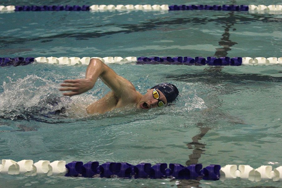 Stroking forward, sophomore Colby Beggs competes in the 500 yard freestyle.