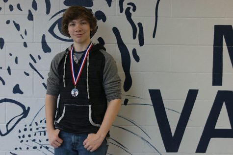Junior Andrew Thomas plays competitive chess
