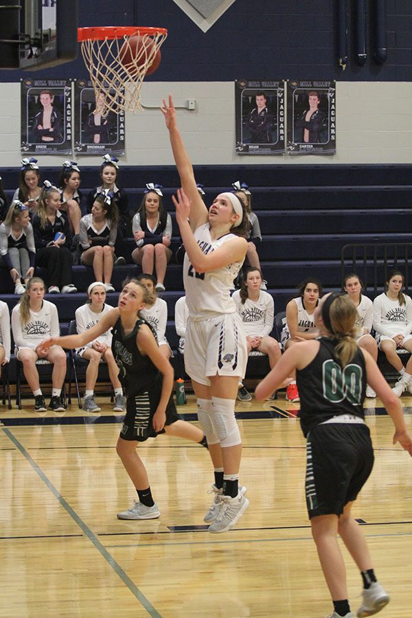 After junior Trinity Knapp gets past a defender, she shoots the ball and makes the shot.