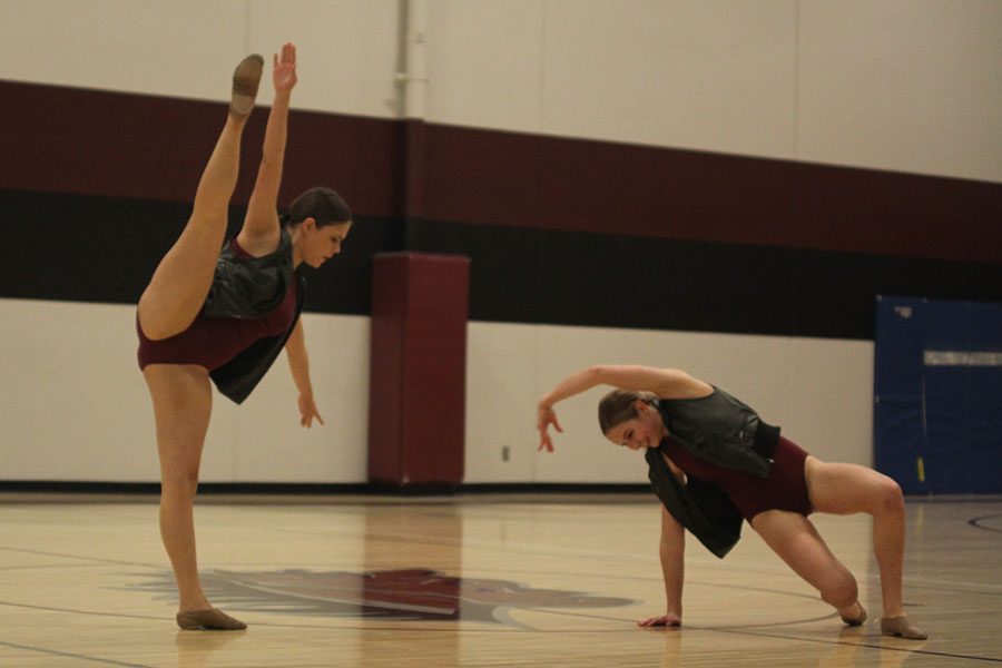 Sophomores Samantha Pennington and Sydney Ebner perform in their ensemble with Ali Greenhalgh (not pictured). The sophomore ensemble placed first in its division.