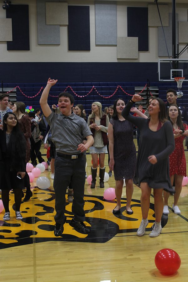 Junior Matt Santaularia dances to The Cupid Shuffle with his friends.