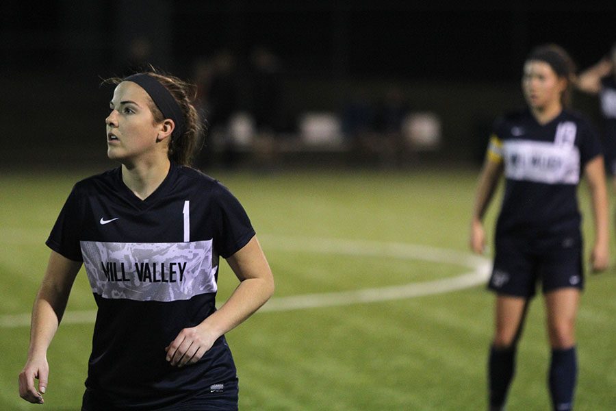 During the second half, senior Gracie Eckardt observes the play.