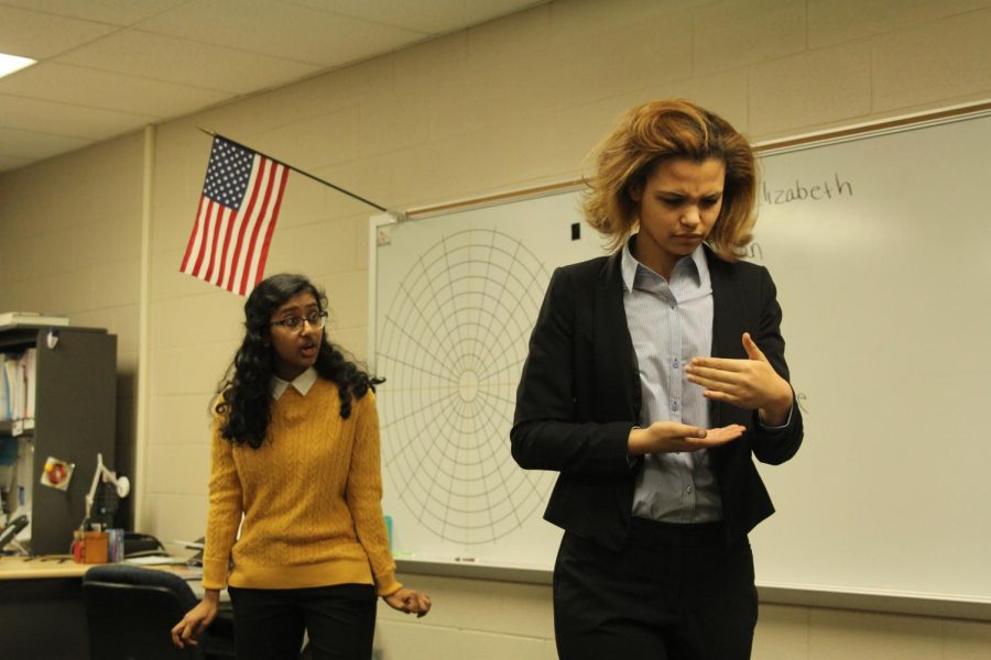 In their duos acting, juniors Elizabeth Joseph and Lucy Graff perform a short comical skit about the ashes of a daughters father.