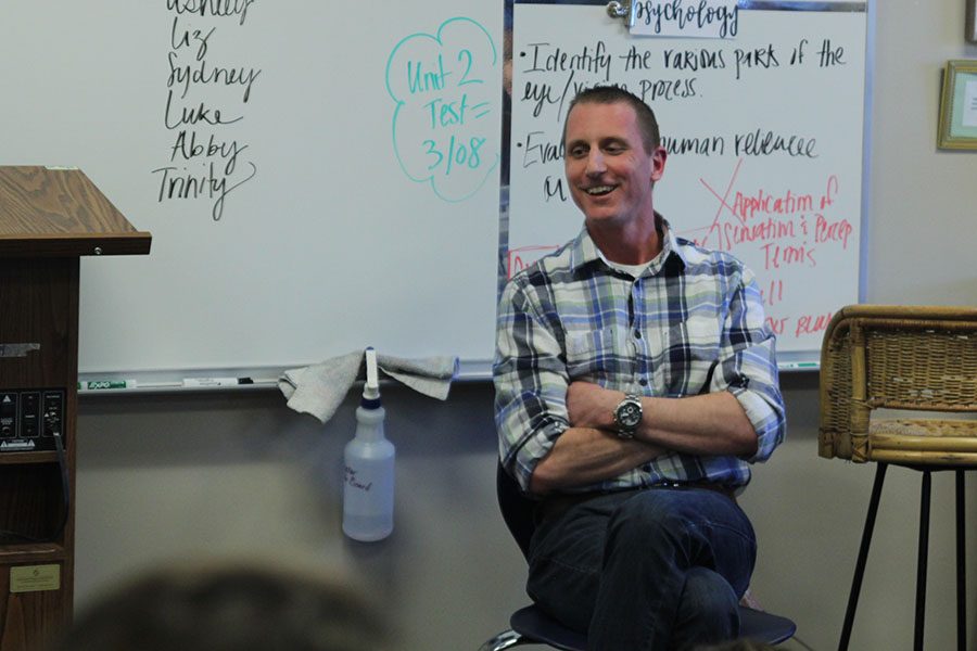 The guest speaker, a psychotherapist, Lane Laird smiles while answering a question on Friday, March 2. 