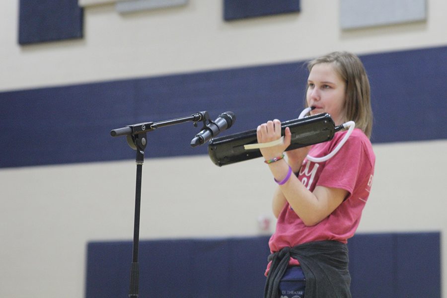 Senior Marissa Olin plays her melodica at open mic.