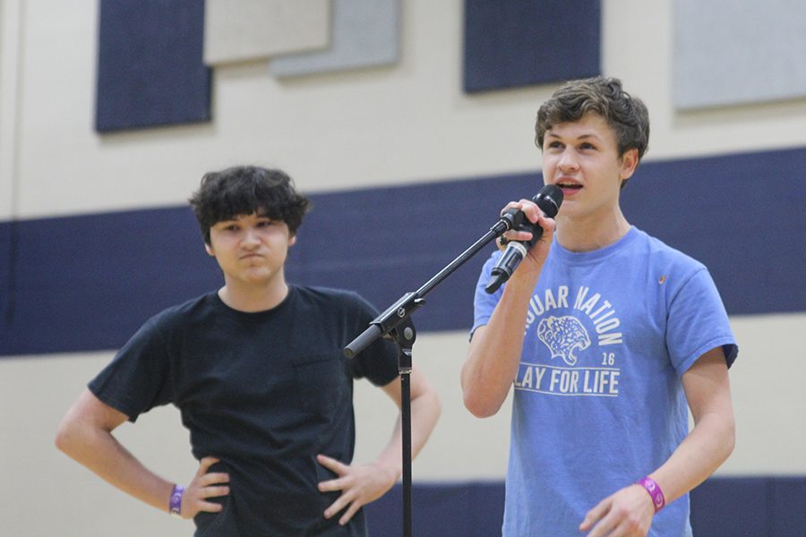 Senior Graham Wilhauk and junior Noah Smith perform their duet from "Into the Woods" during open mic.