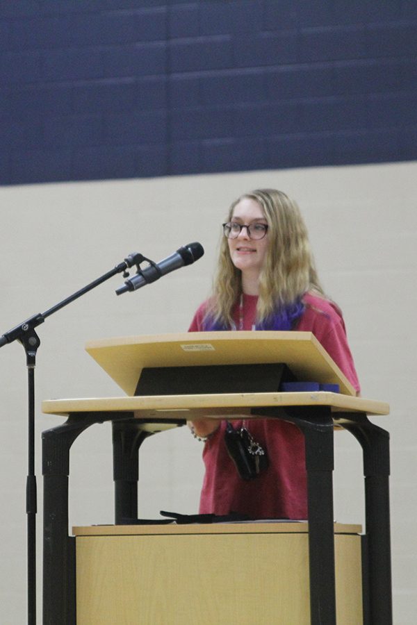 Committee chair senior Dani Crispin speaks during the closing ceremony.